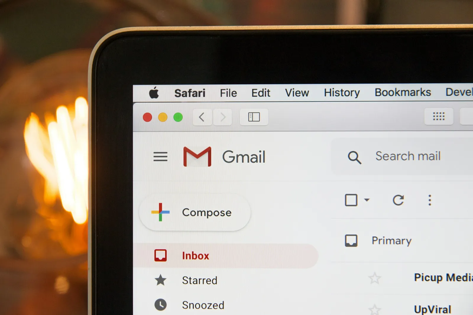 A laptop open on a Gmail inbox.
